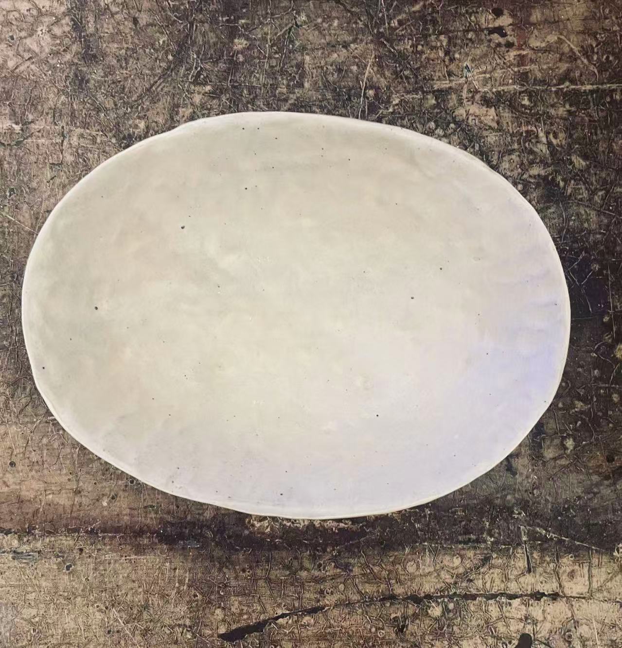 Medium Matt Warm Ivory Oval Stoneware Footed Plate